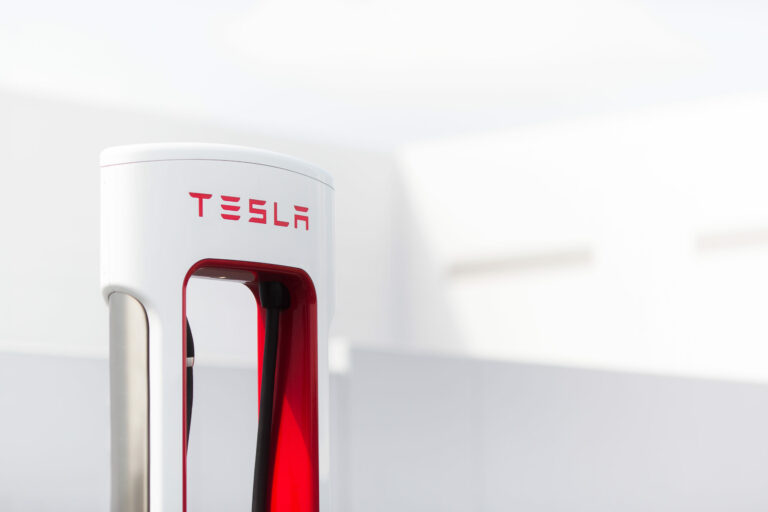 Close-up of a Tesla Supercharger station in operation