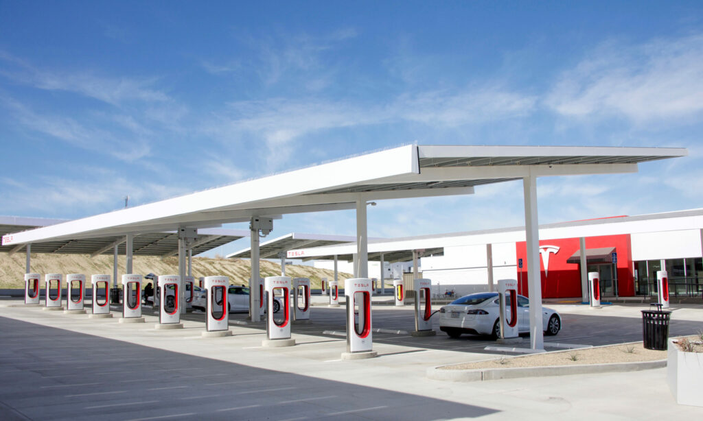Tesla charging station with solar roof in Kettleman City, CA.