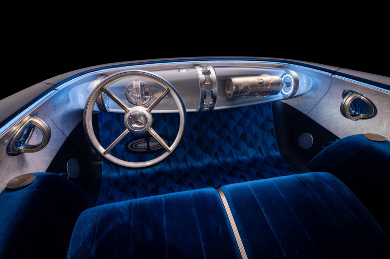 Futuristic interior of the Mercedes-Benz Vision Iconic with Zeppelin dashboard and glass steering wheel