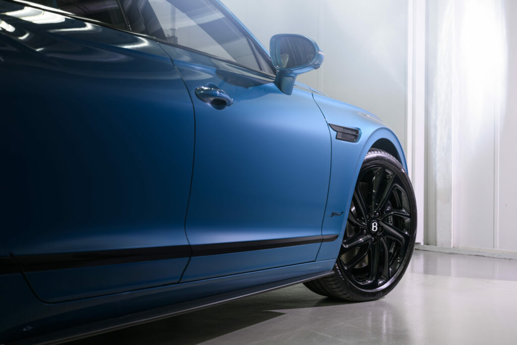 Detail of front door and wheel Bentley Flying Spur hybrid 2025
