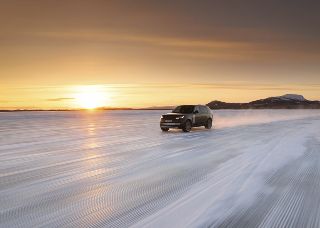 Range Rover Electric in a desert arctic landscape, remote luxury electric SUV