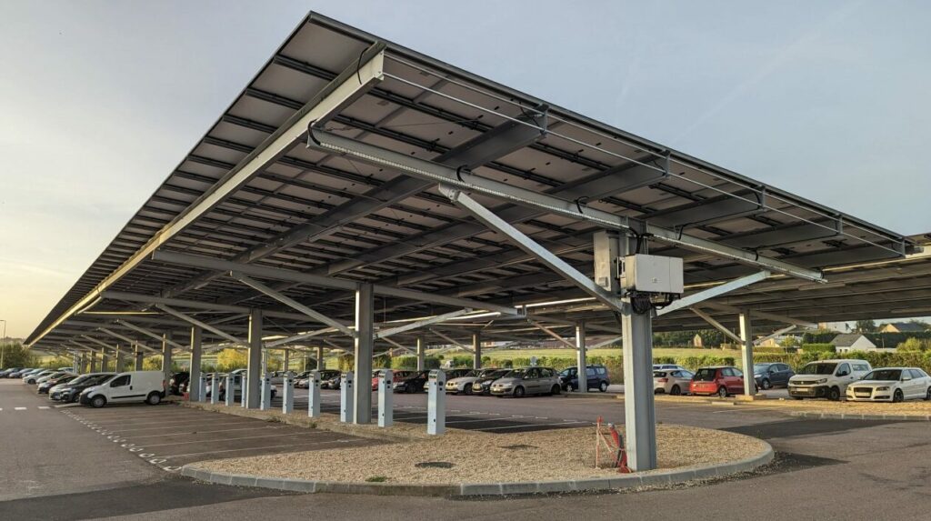 Solar charging stations for electric cars in a car park in Martinique.