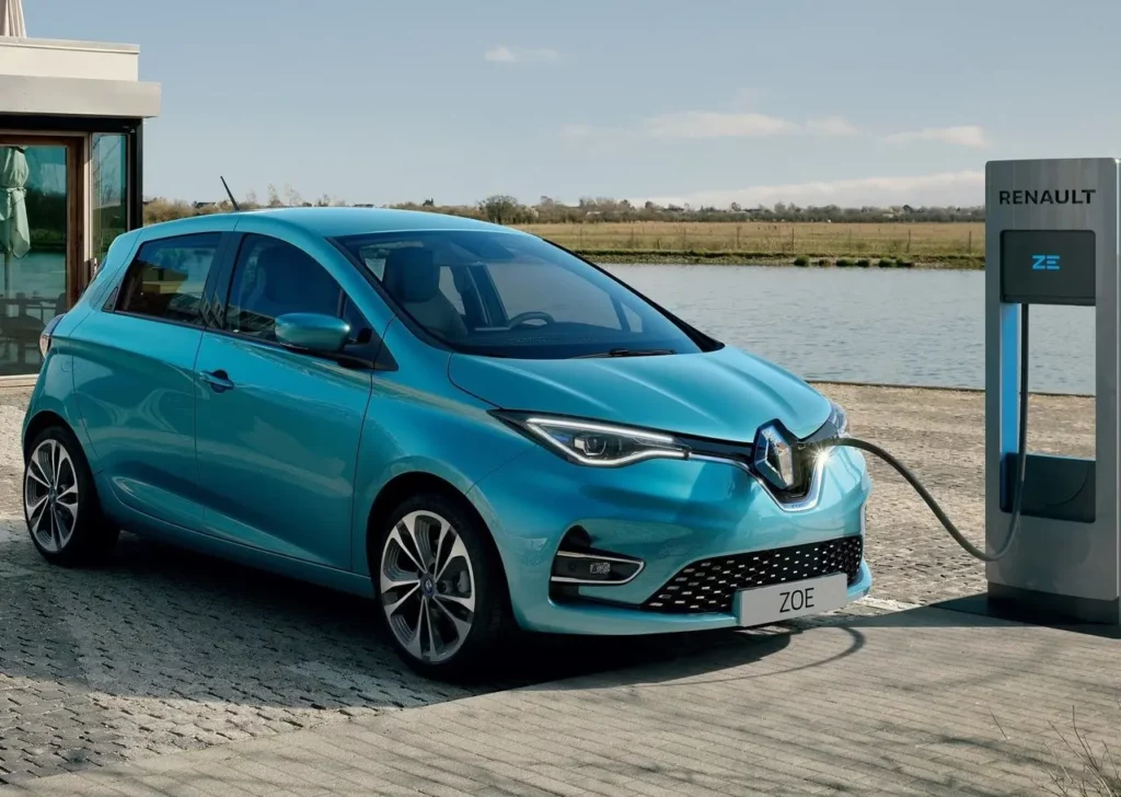 Renault Zoe plugged into an electric charging point.