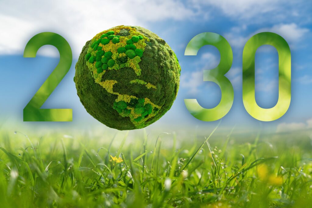 2030 with a green planet symbolising the ecological transition